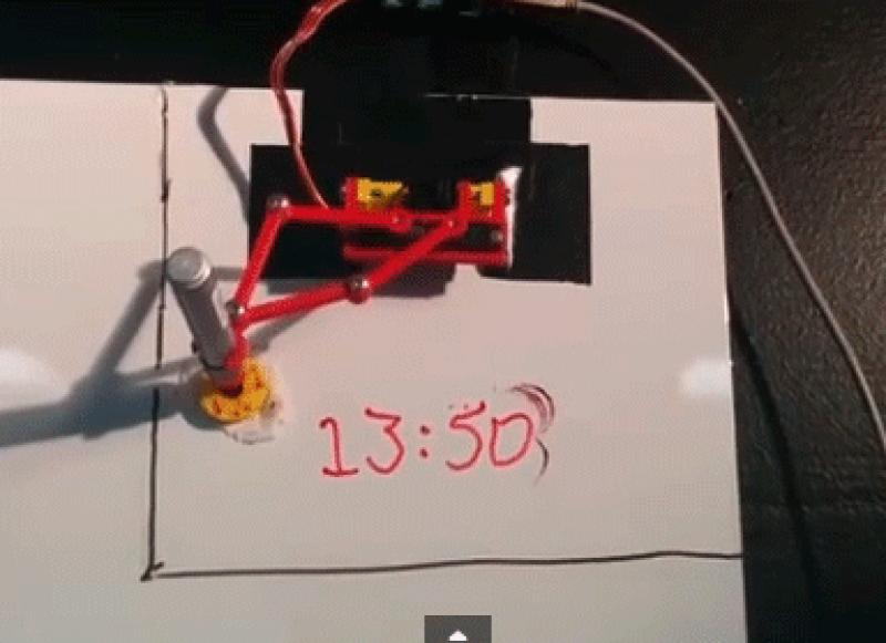Clever clock scribbles the time on a whiteboard
This magnificent little device by Maurice Bos actually scrawls the time onto a whiteboard using an ordinary dry-